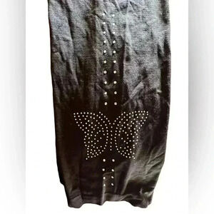 Maternity one size butterfly black stretchy capris with rhinestones.‎